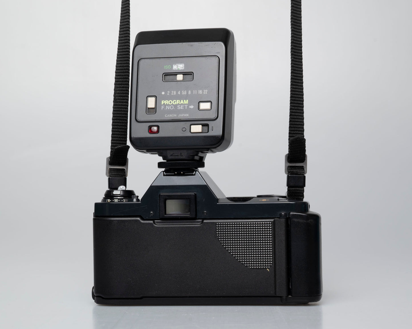 Canon T50 35mm film SLR camera w/ FD 35-70mm lens + Speedlite 277T flash + ever-ready case (serial 1061065)