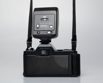 Canon T50 35mm film SLR camera w/ FD 35-70mm lens + Speedlite 277T flash + ever-ready case (serial 1061065)