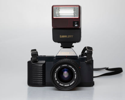 Canon T50 35mm film SLR camera w/ FD 35-70mm lens + Speedlite 277T flash + ever-ready case (serial 1061065)