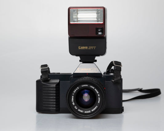 Canon T50 35mm film SLR camera w/ FD 35-70mm lens + Speedlite 277T flash + ever-ready case (serial 1061065)
