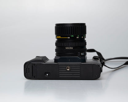 Canon T50 35mm film SLR camera w/ FD 35-70mm lens + Speedlite 277T flash + ever-ready case (serial 1061065)