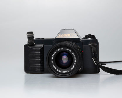 Canon T50 35mm film SLR camera w/ FD 35-70mm lens + Speedlite 277T flash + ever-ready case (serial 1061065)