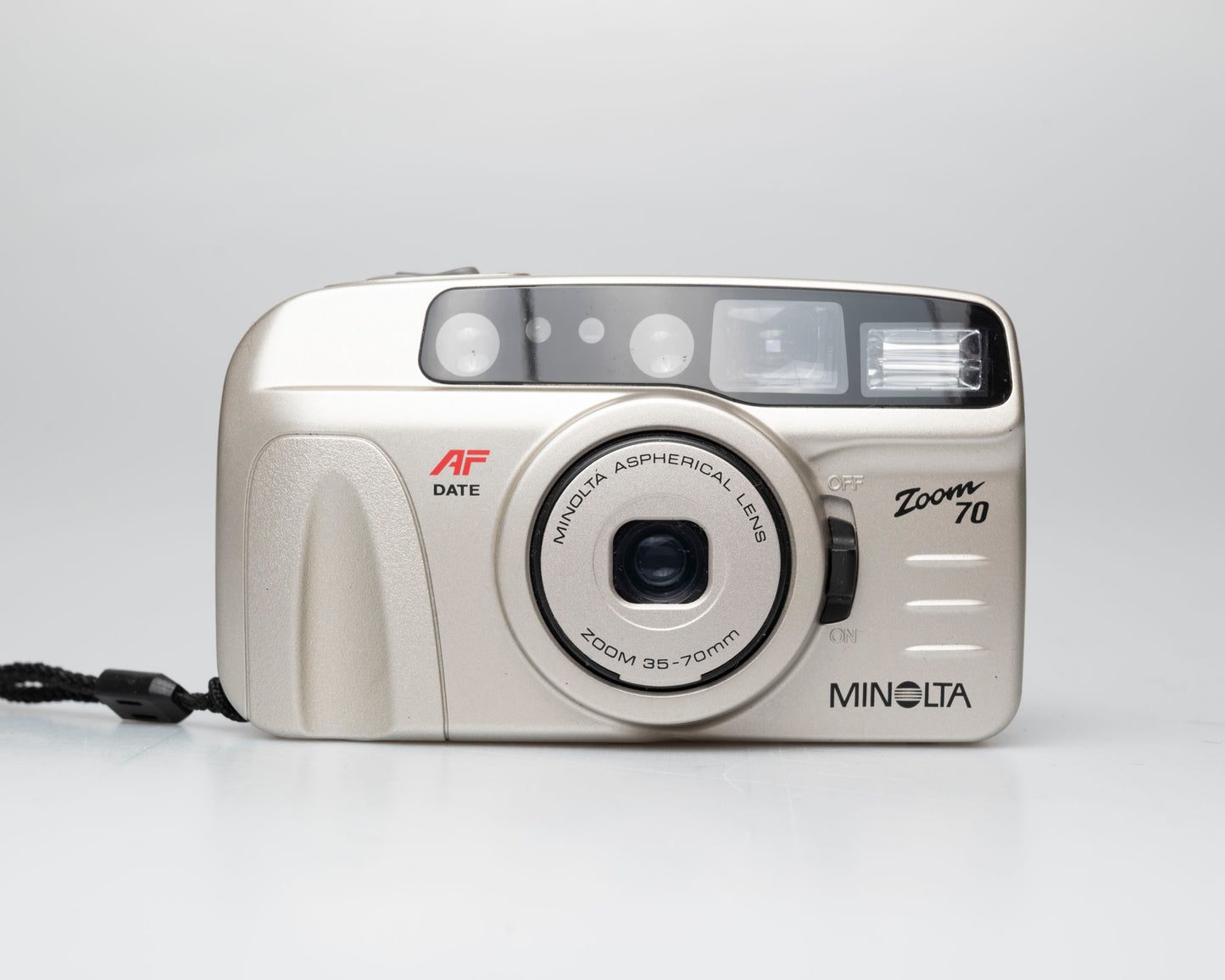 Minolta Zoom 70 35mm camera w/ case + manual (serial 36116970)