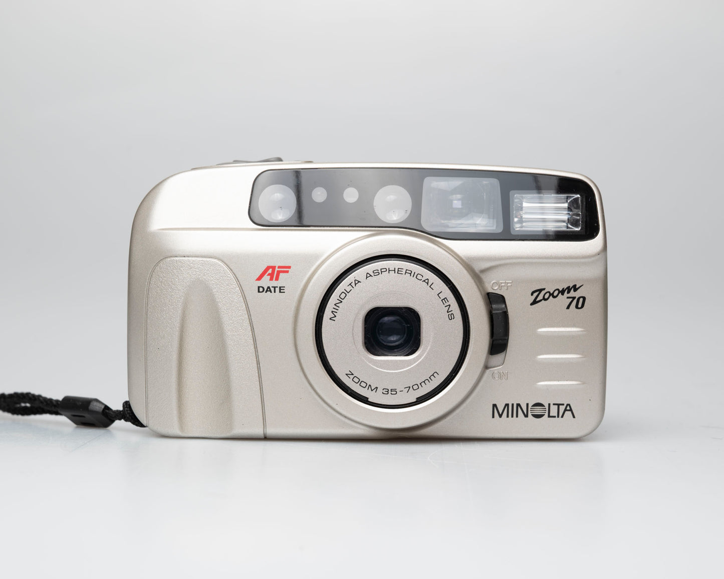 Minolta Zoom 70 35mm camera w/ case + manual (serial 36116970)