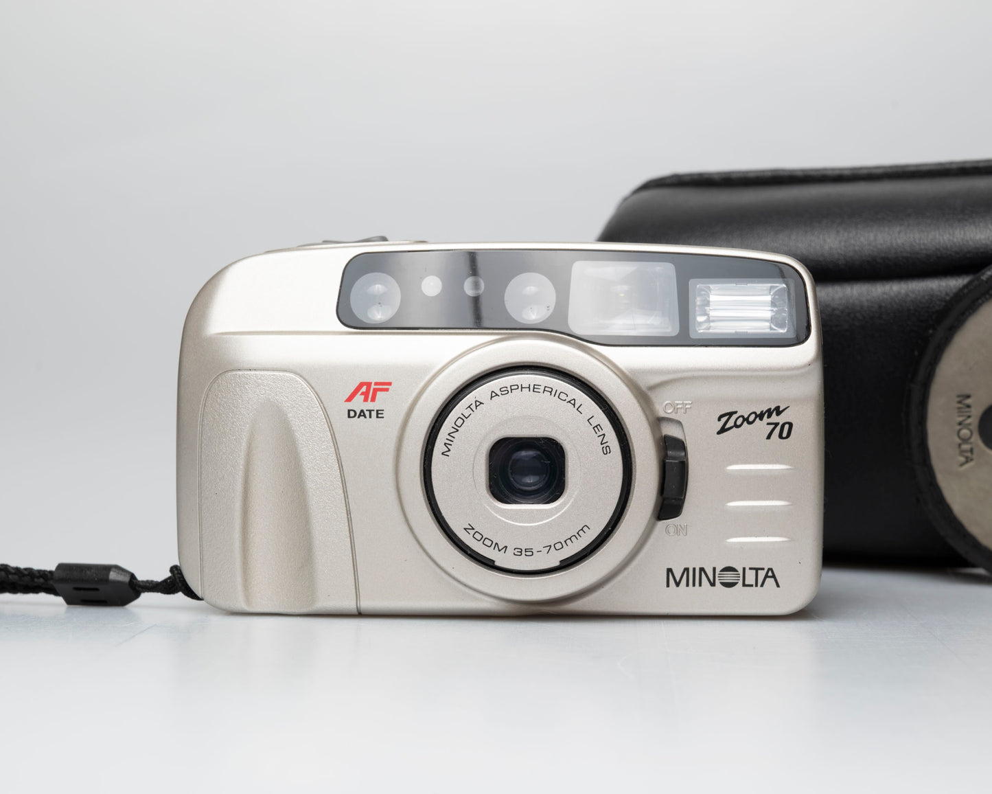 Minolta Zoom 70 35mm camera w/ case + manual (serial 36116970)