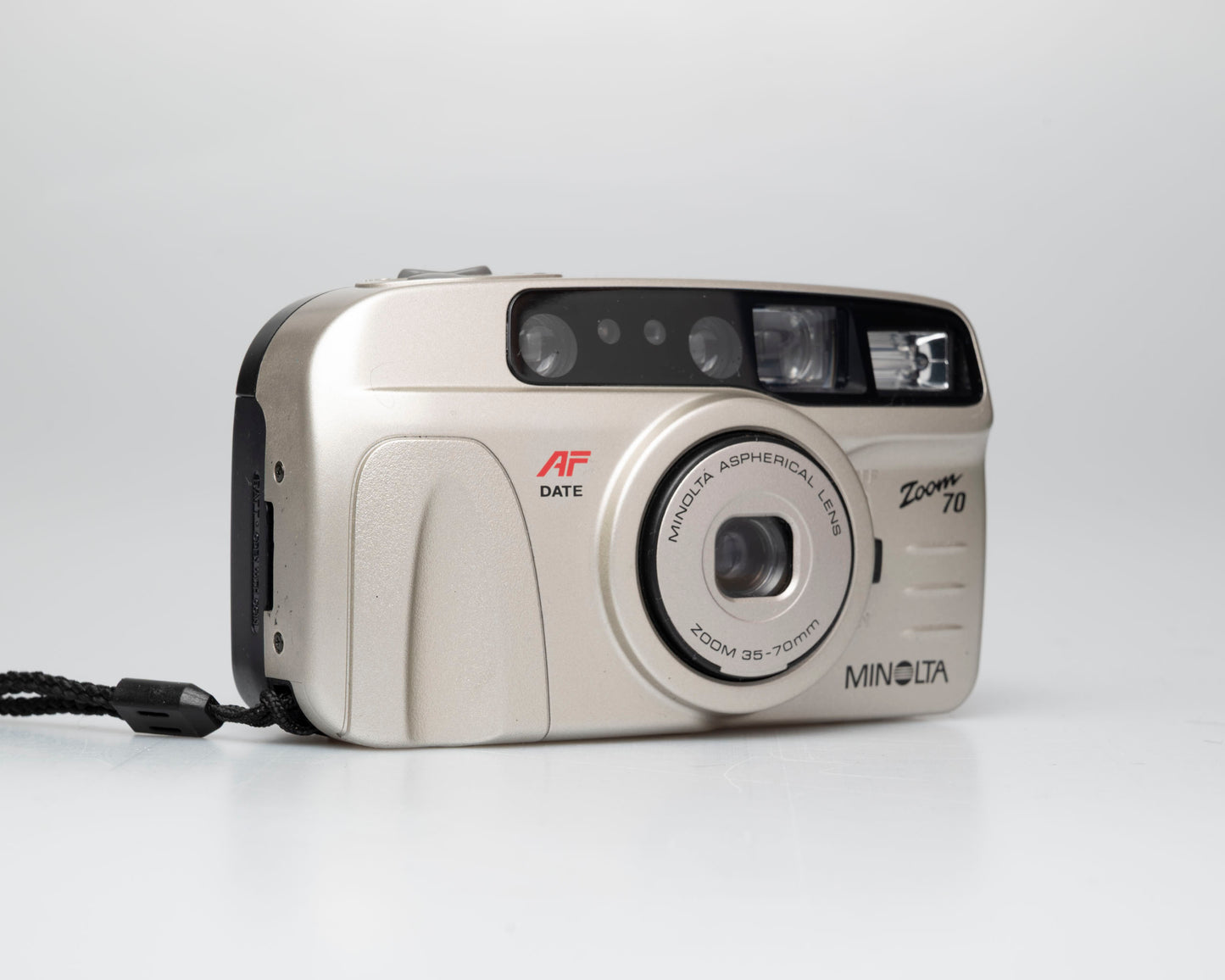 Minolta Zoom 70 35mm camera w/ case + manual (serial 36116970)