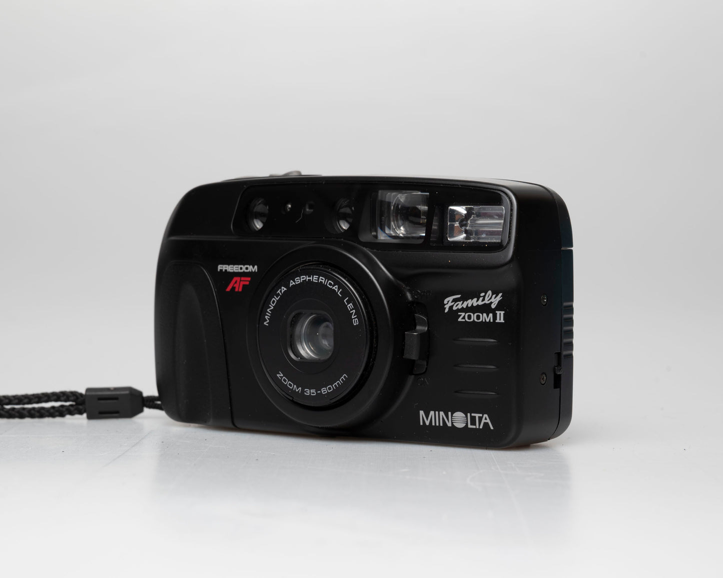 Minolta Family Zoom II 35mm camera w/ case (serial 41974429)