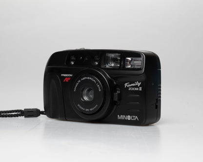Minolta Family Zoom II 35mm camera w/ case (serial 41974429)