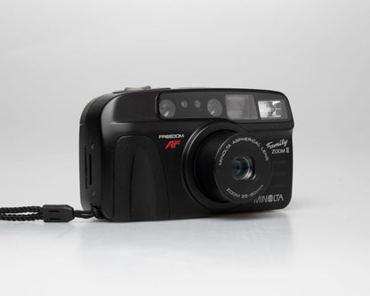 Minolta Family Zoom II 35mm camera w/ case (serial 41974429)