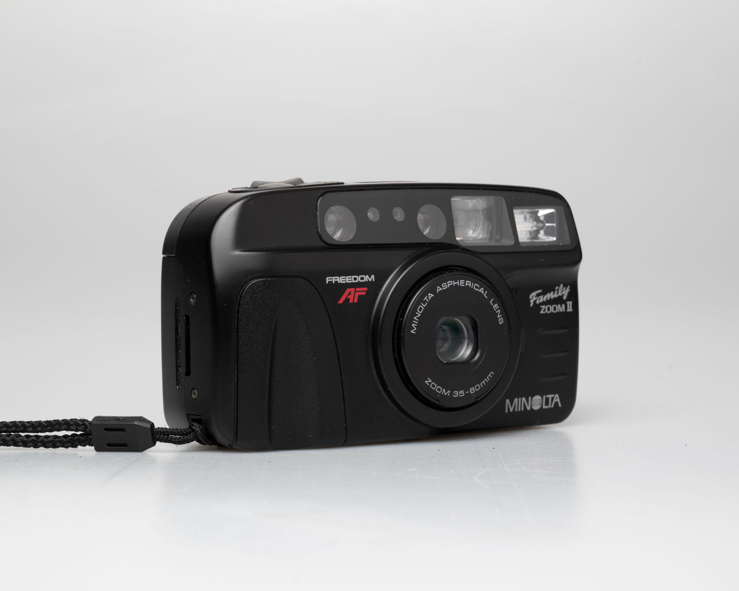 Minolta Family Zoom II 35mm camera w/ case (serial 41974429)