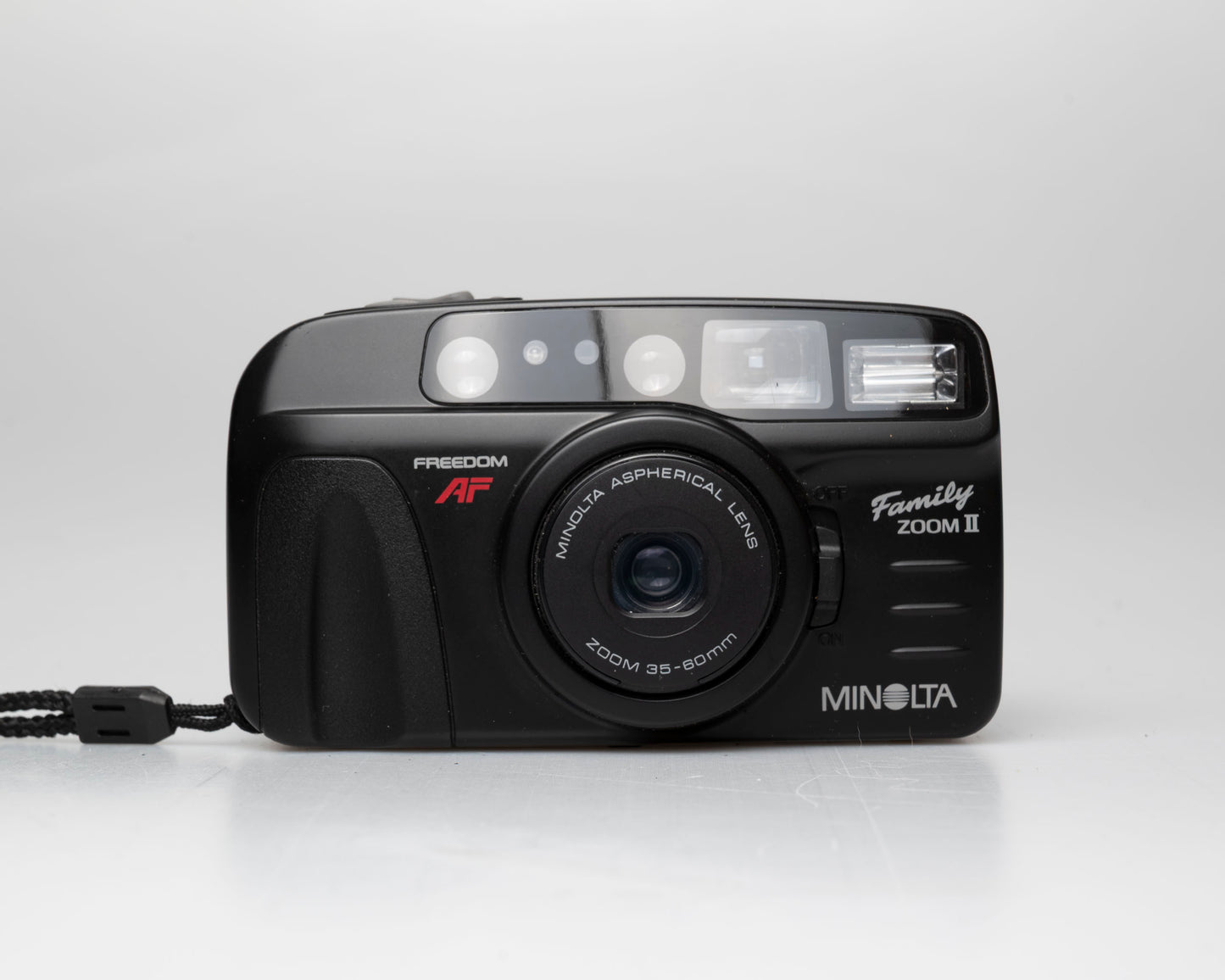 Minolta Family Zoom II 35mm camera w/ case (serial 41974429)