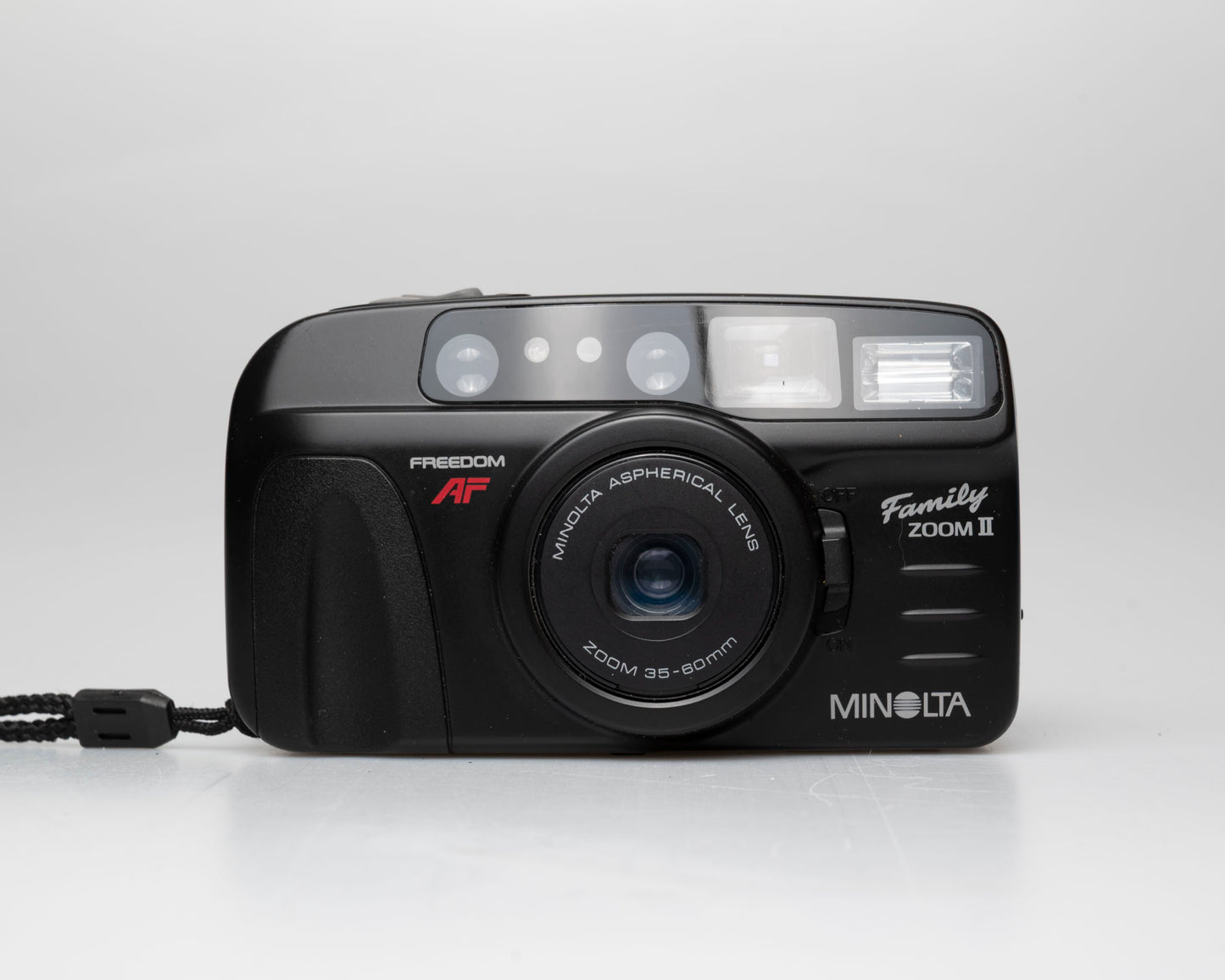 Minolta Family Zoom II 35mm camera w/ case (serial 41974429)