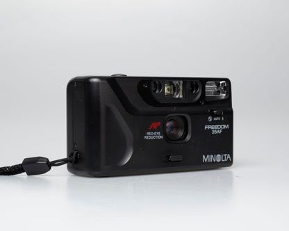Minolta Freedom 35AF 35mm point-and-shoot camera w/ box, case, and manual (serial 19401562)