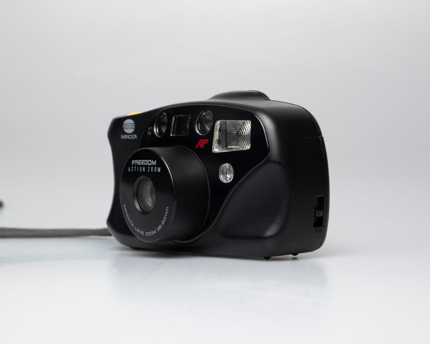 Minolta Freedom Action Zoom appareil photo 35mm *moteur bruyant* (série 93374092)