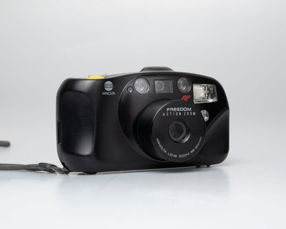 Minolta Freedom Action Zoom appareil photo 35mm *moteur bruyant* (série 93374092)