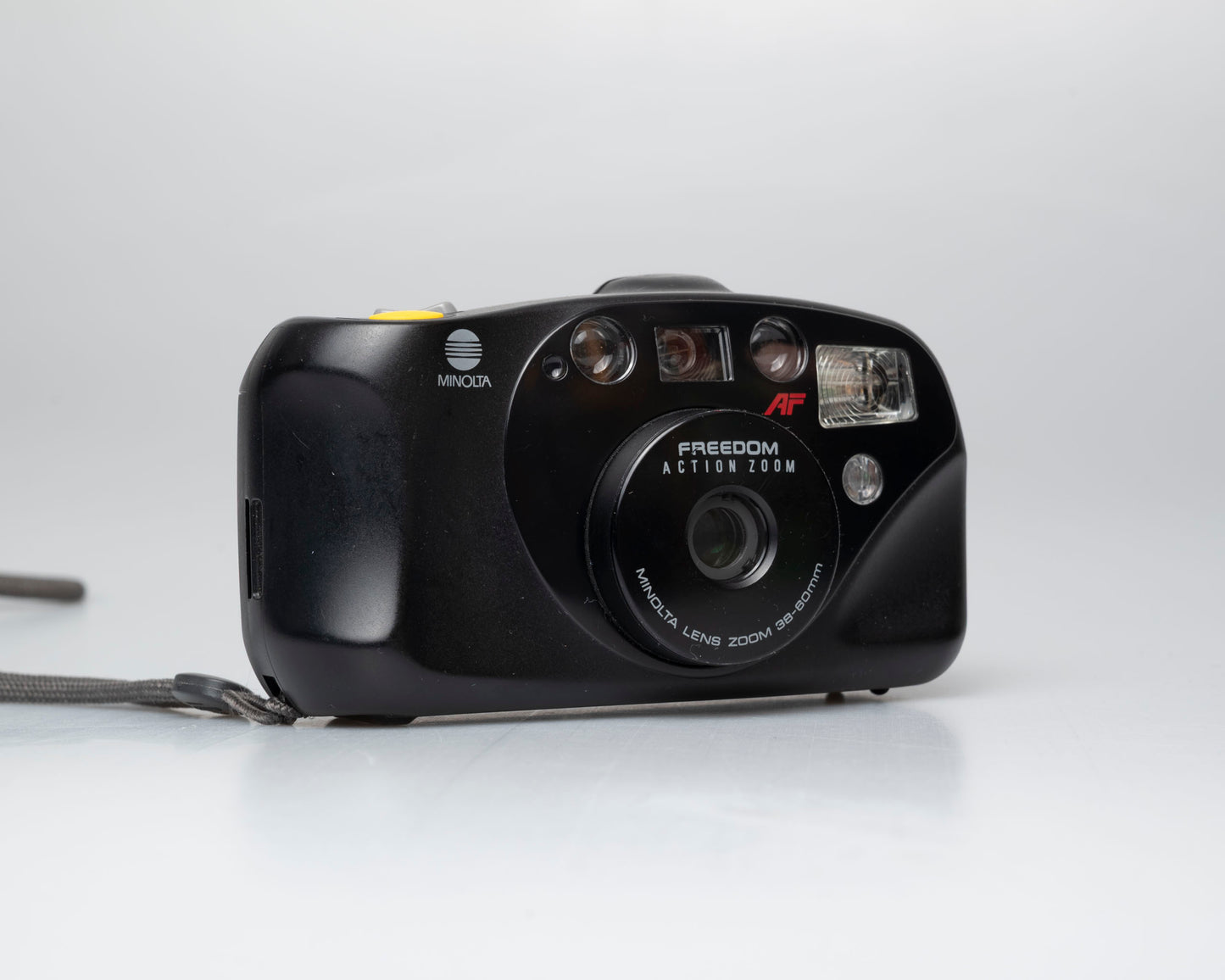 Minolta Freedom Action Zoom appareil photo 35mm *moteur bruyant* (série 93374092)