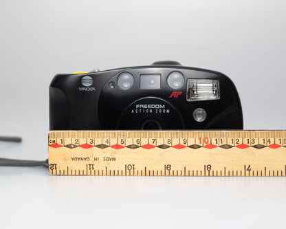 Minolta Freedom Action Zoom appareil photo 35mm *moteur bruyant* (série 93374092)