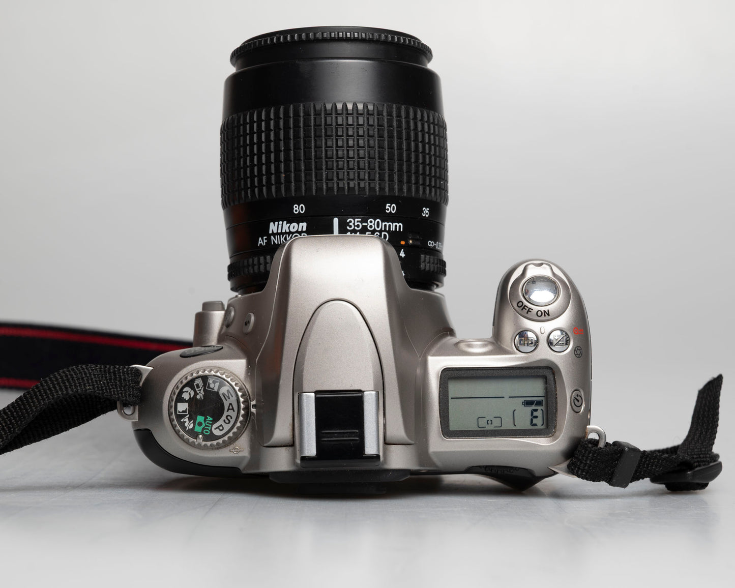 Nikon F55 35mm film SLR w/ AF Nikkor 35-80mm lens (serial 2269252)