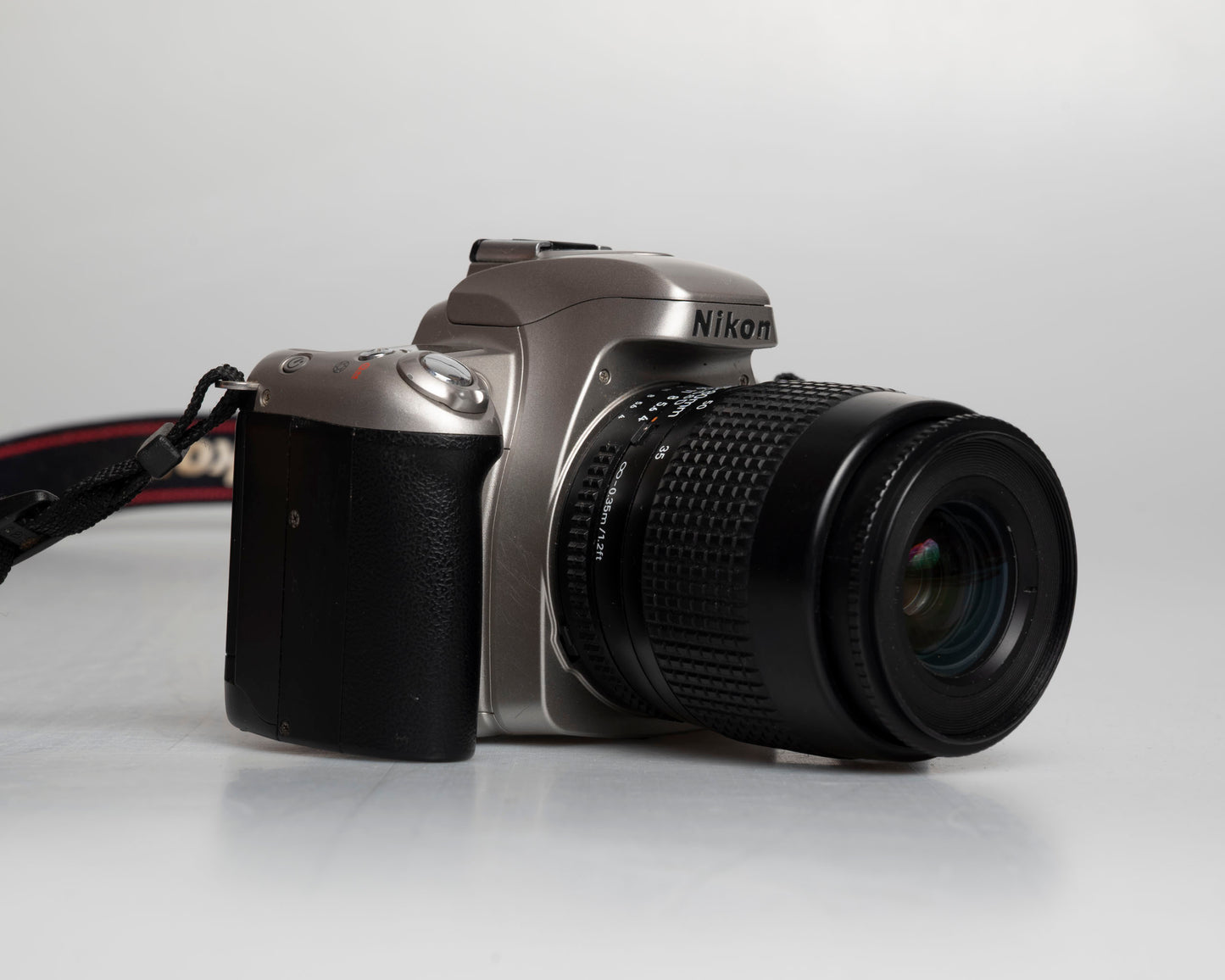 Nikon F55 35mm film SLR w/ AF Nikkor 35-80mm lens (serial 2269252)