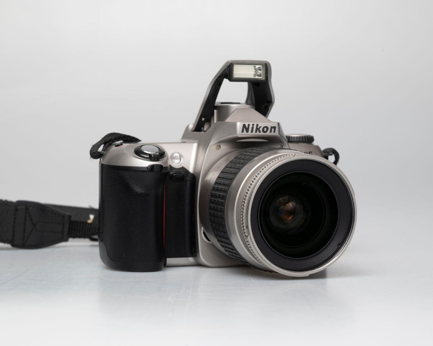 Nikon F65 (aka N65) 35mm film SLR w/ AF Nikkor 28-80mm lens (serial 2880569)