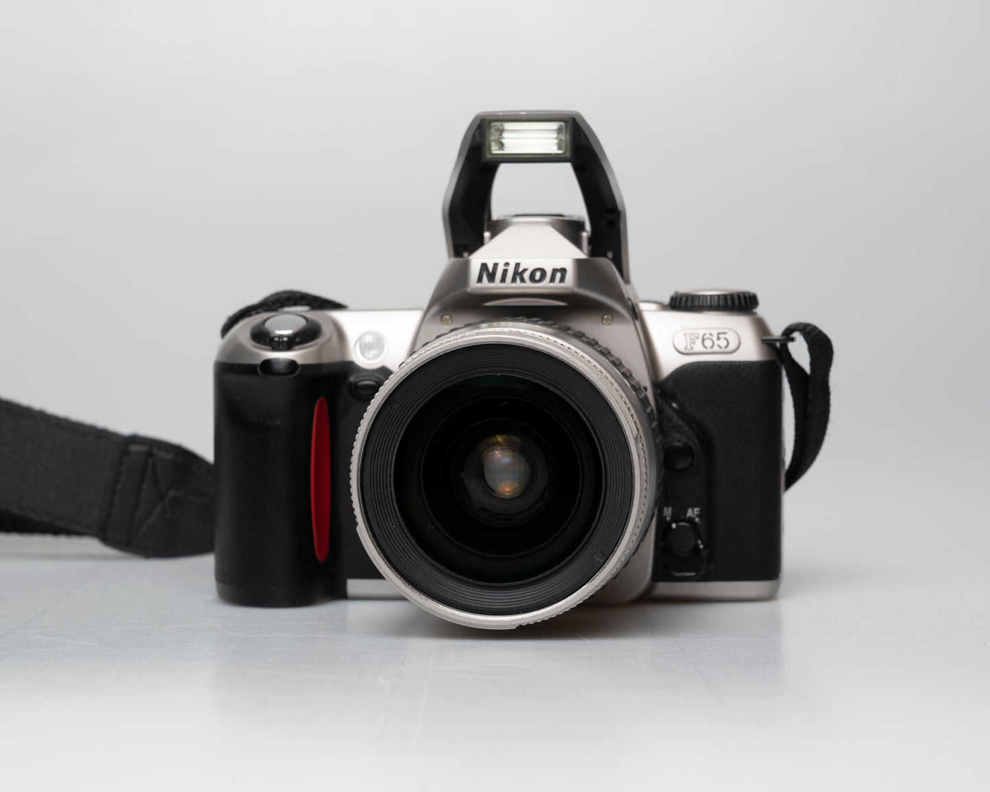 Nikon F65 (aka N65) 35mm film SLR w/ AF Nikkor 28-80mm lens (serial 2880569)