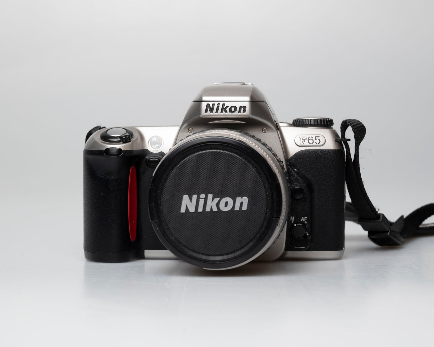 Nikon F65 (aka N65) 35mm film SLR w/ AF Nikkor 28-80mm lens (serial 2880569)