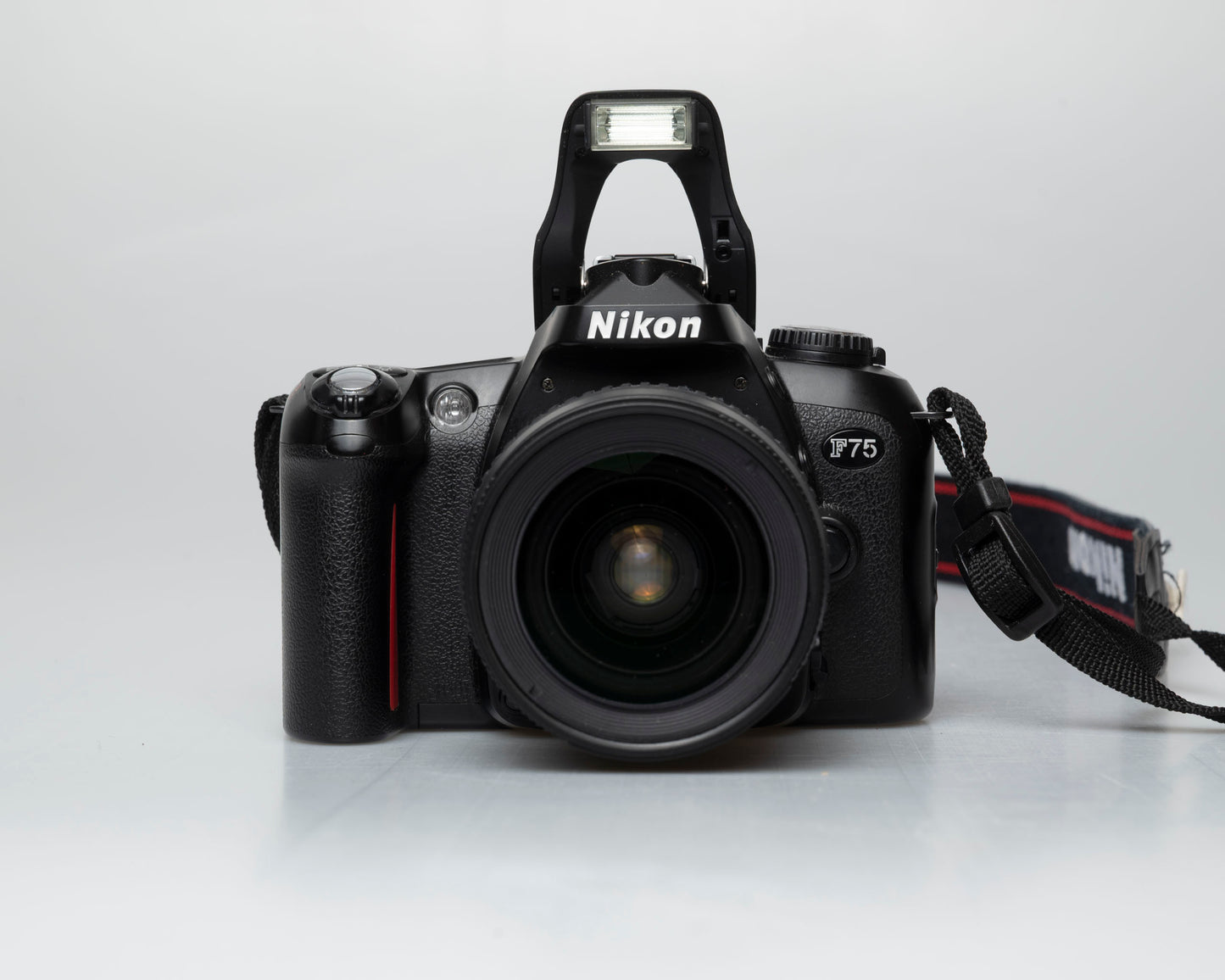 Nikon F75 35mm film SLR w/ AF Nikkor 28-80mm lens (serial 2258155)