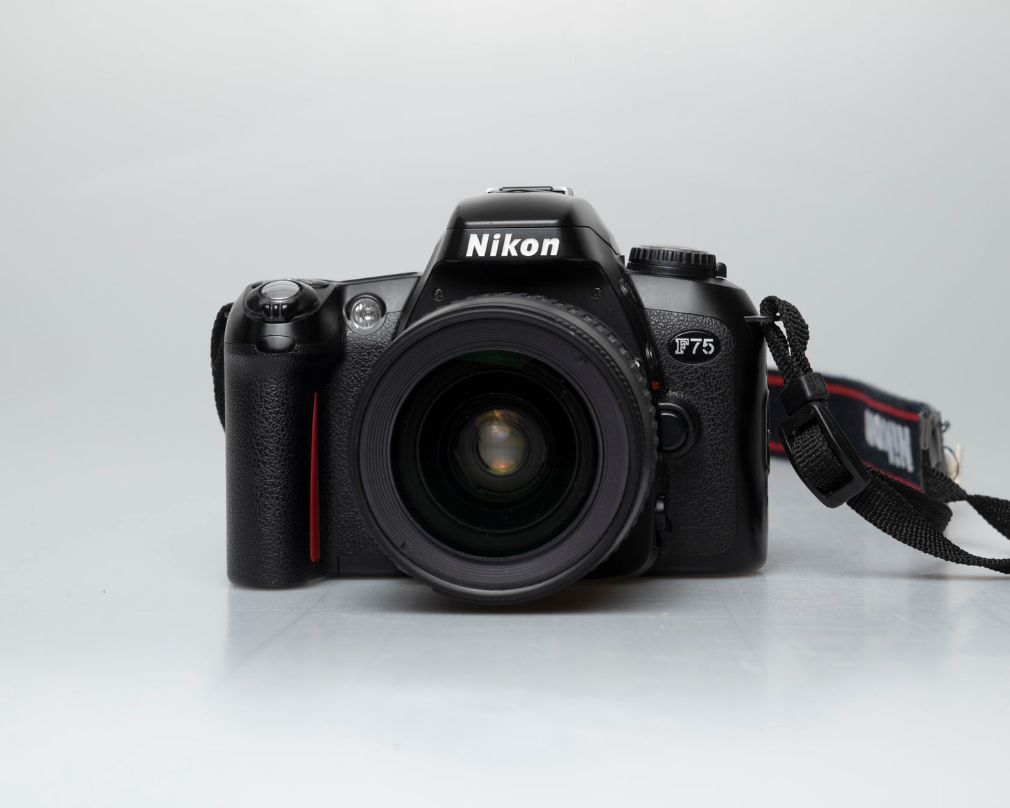 Nikon F75 35mm film SLR w/ AF Nikkor 28-80mm lens (serial 2258155)