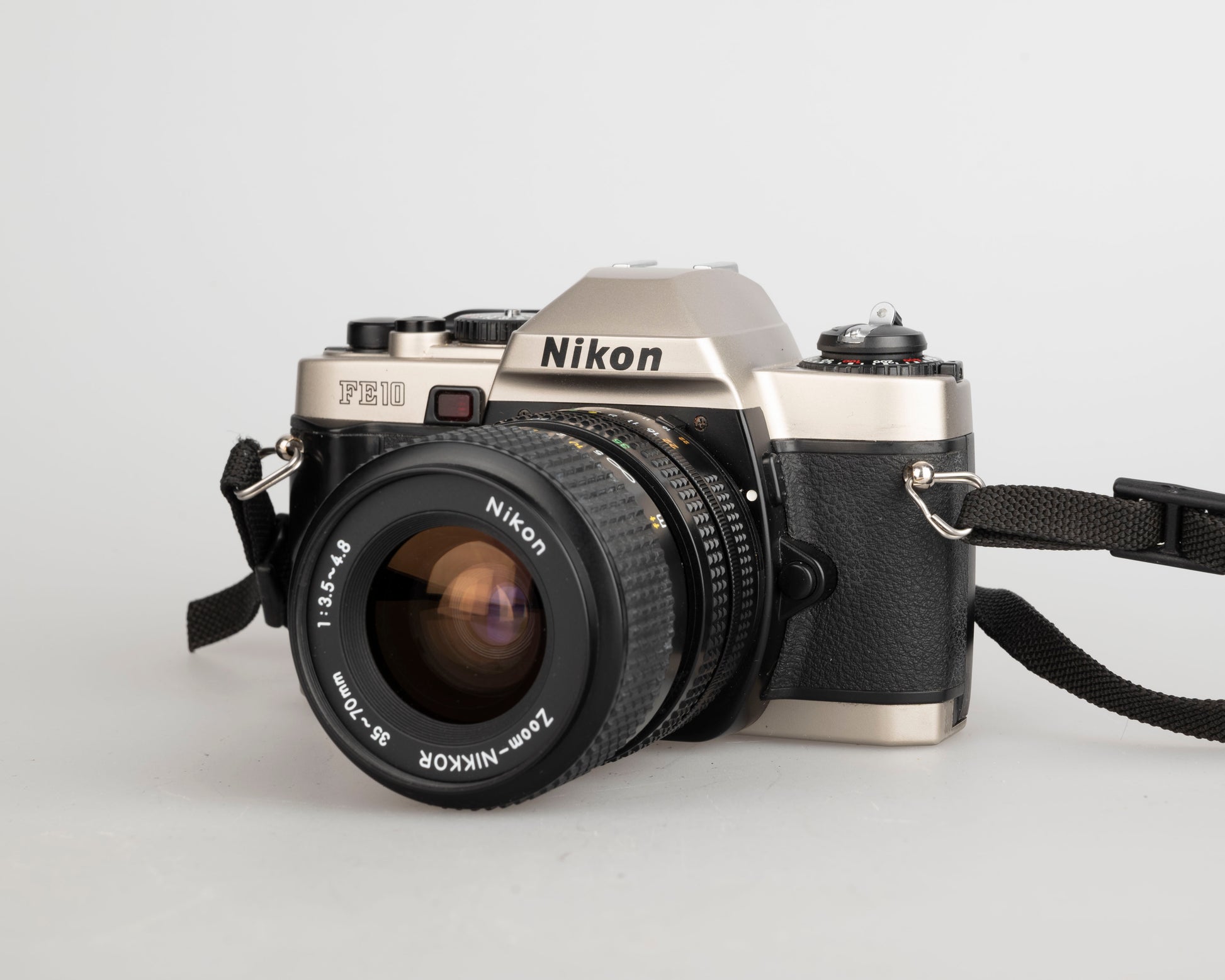 Nikon FE10 35mm film SLR camera w/ Zoom-Nikkor 35-70mm lens ever