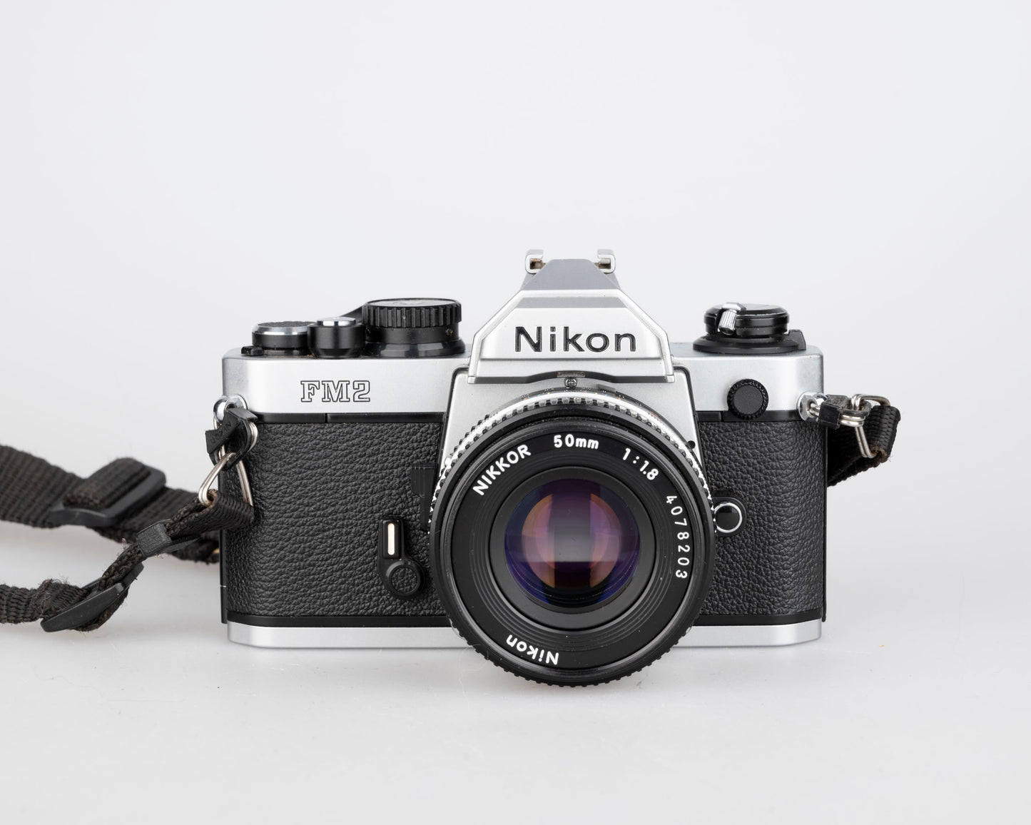 Nikon FM2n 35mm film SLR camera w/ Nikkor 50mm f1.8 lens + manuals in English and French (serial 8518258)