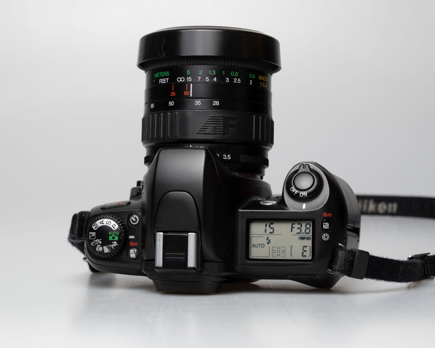 Nikon N65 35mm film SLR w/ AF Vivitar 28-80mm lens (serial 2537429)