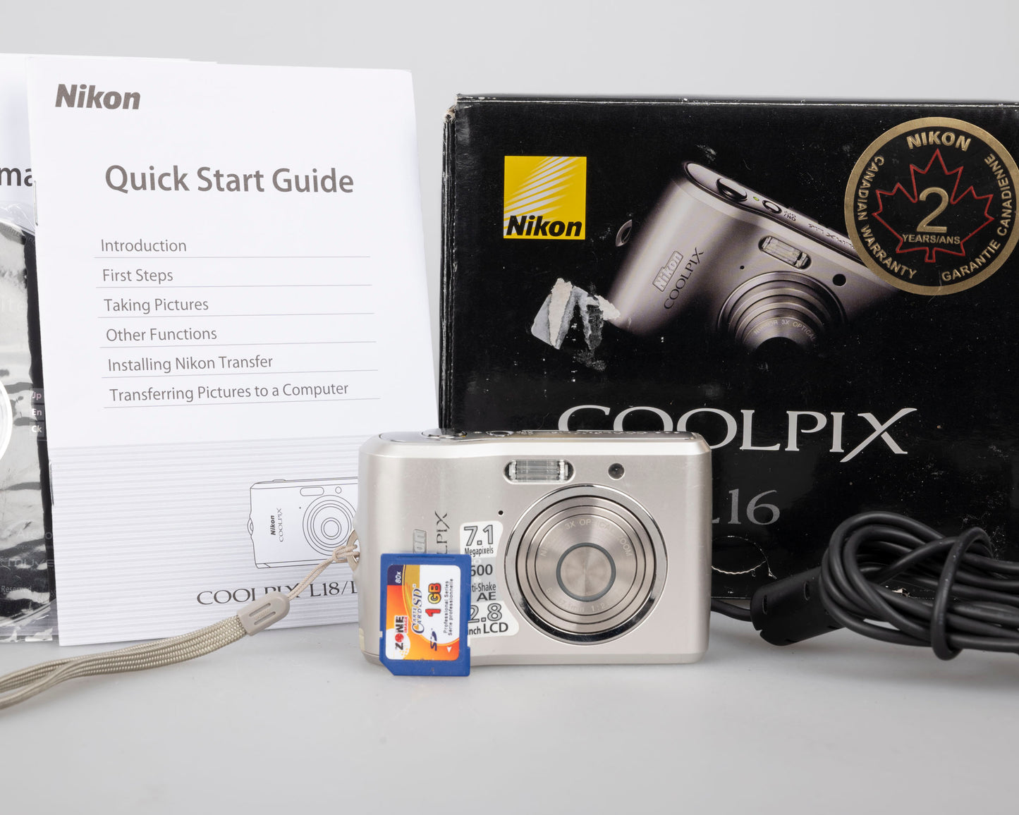Nikon Coolpix L16 7.1 MP CCD sensor digicam w/ 1GB SD card + original box and accessories (uses AA batteries)