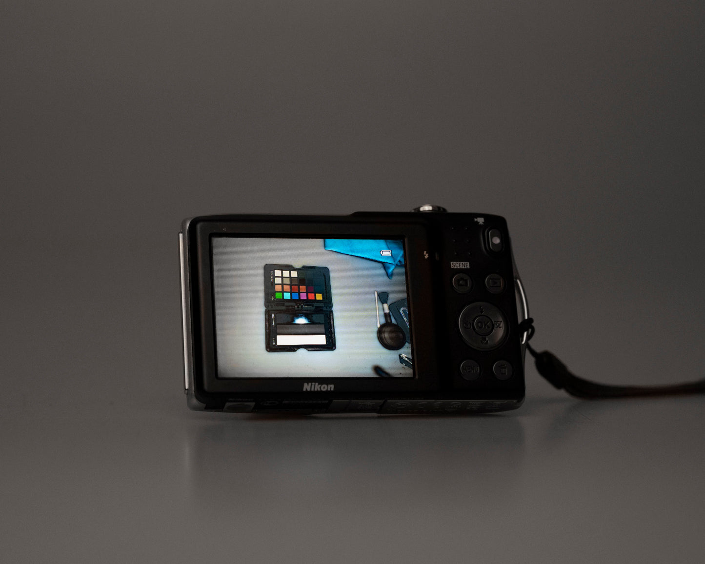 Nikon Coolpix S5300 16MP digicam w/ 64GB SD card + battery + charger (serial 300474121)