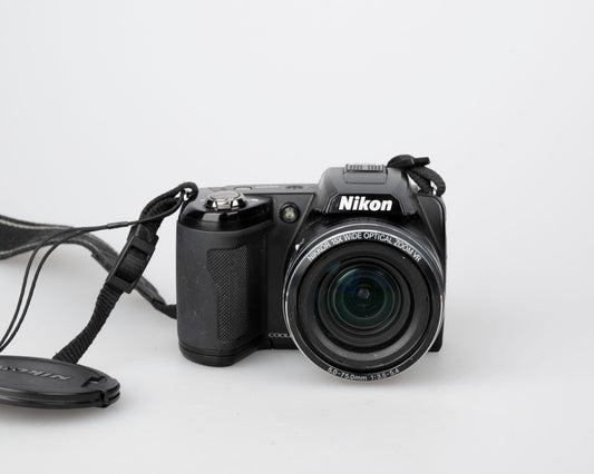 Nikon Coolpix L100 12.1 MP CCD sensor digicam (uses AA batteries + SD card)