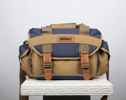Nikon mid-sized tan and blue camera bag