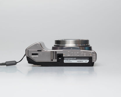 Olympus SZ-12 14MP digicam w/ 8GB SD card (serial JJ4239414)