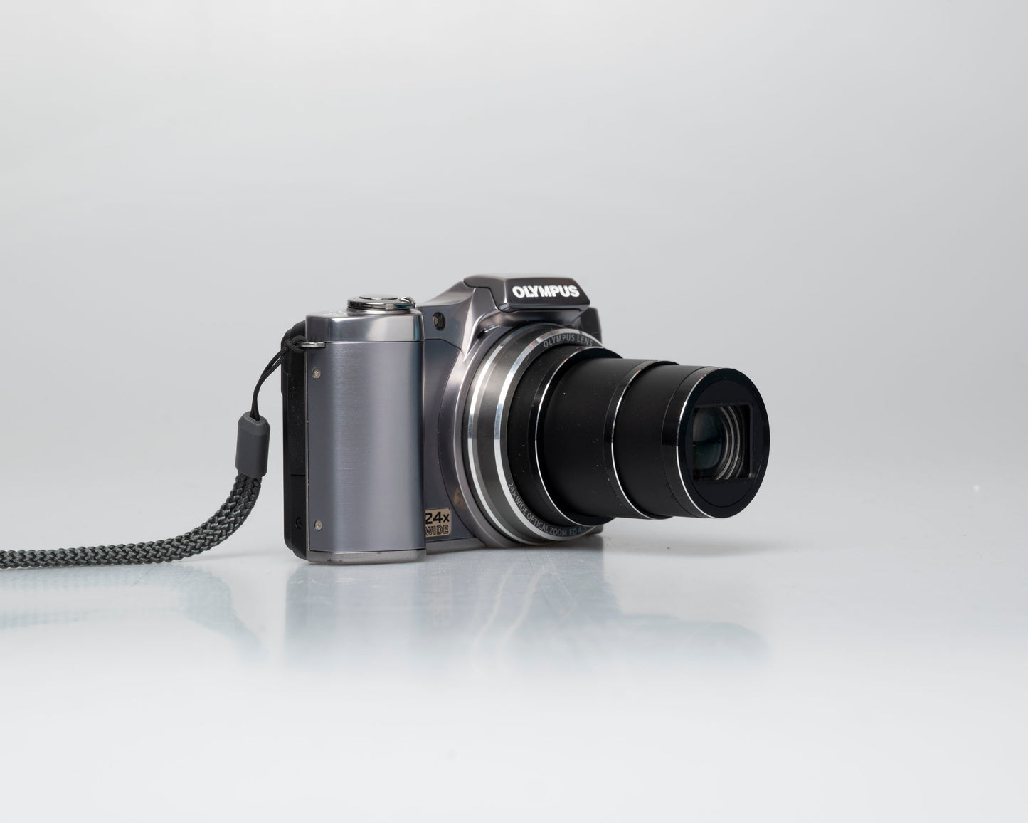 Olympus SZ-12 14MP digicam w/ 8GB SD card (serial JJ4239414)