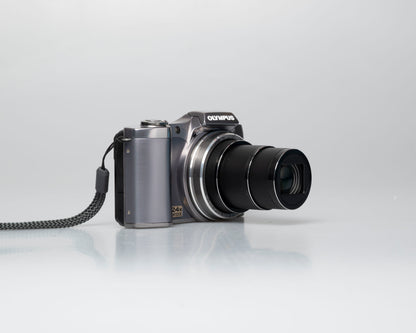 Olympus SZ-12 14MP digicam w/ 8GB SD card (serial JJ4239414)