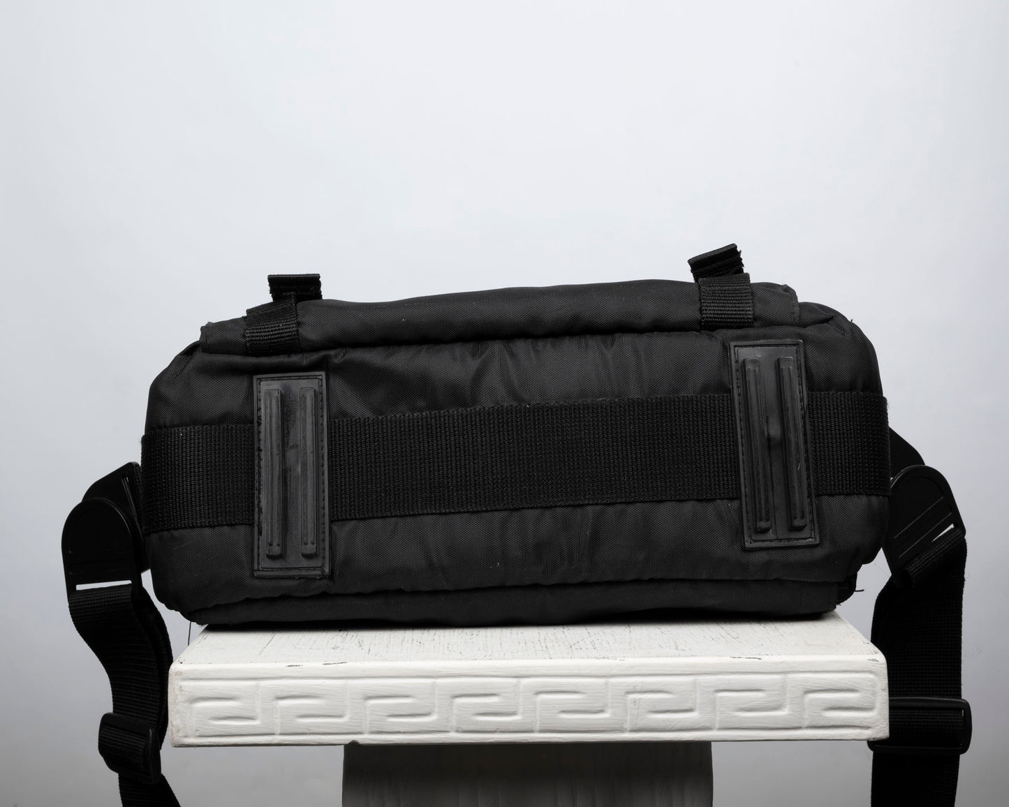 Optex medium-to-large sized black camera bag