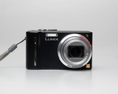 Panasonic Lumix DMC-ZS5 digicam w/ charger + battery + etc