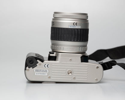 Pentax MZ-50 35mm film camera with kit zoom lens; bottom view