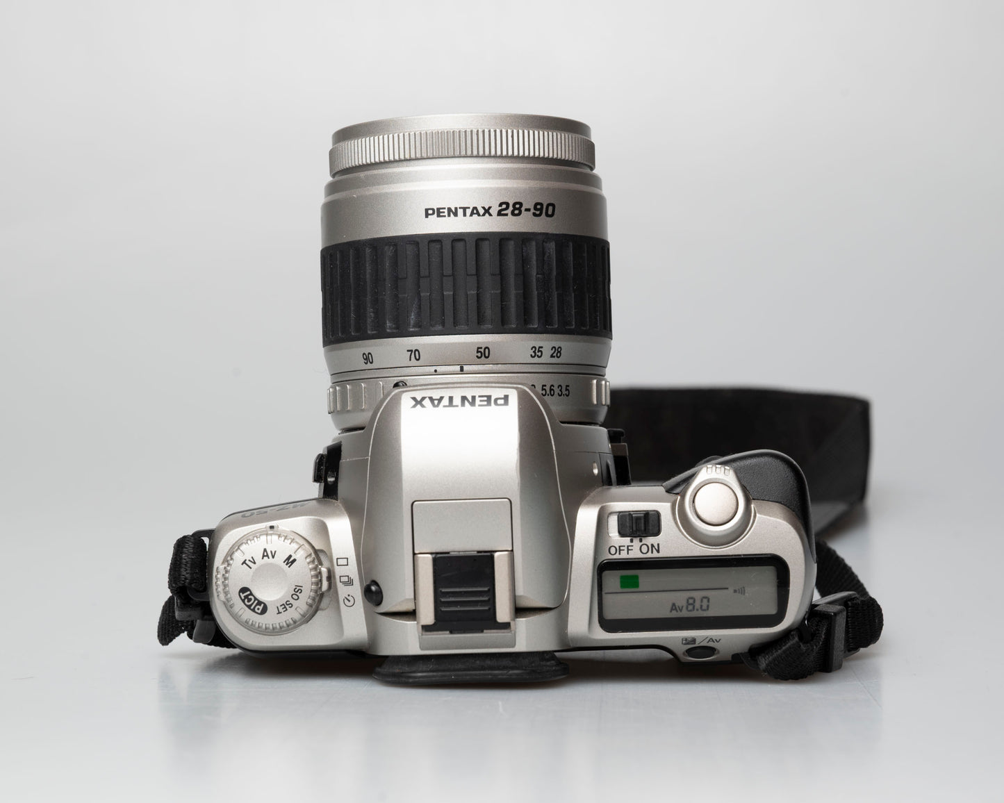 Pentax MZ-50 35mm film camera with kit zoom lens; top view