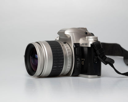 Pentax MZ-50 35mm film camera with kit zoom lens; side view