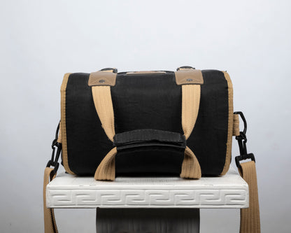 Pentax black and tan mid-sized camera bag
