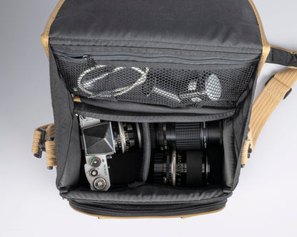 Pentax black and tan mid-sized camera bag