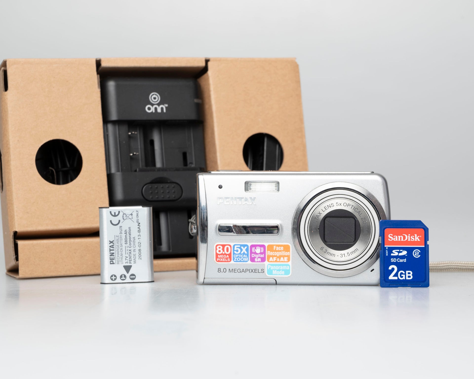 Pentax Optio L50 megapixel digicam w/ 2GB SD card battery