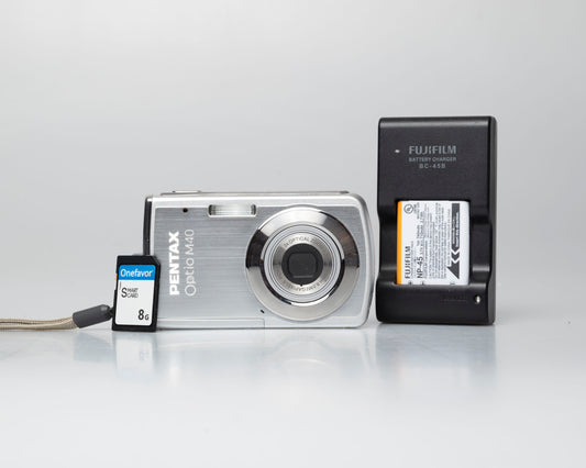 Pentax Optio M40 8 megapixel digicam w/ 8GB SD card + battery + charger (serial 9303499)