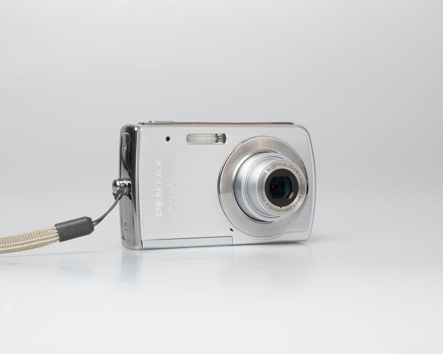 Pentax Optio M40 8 megapixel digicam w/ 8GB SD card + battery + charger (serial 9303499)