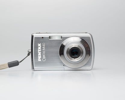 Pentax Optio M40 8 megapixel digicam w/ 8GB SD card + battery + charger (serial 9303499)
