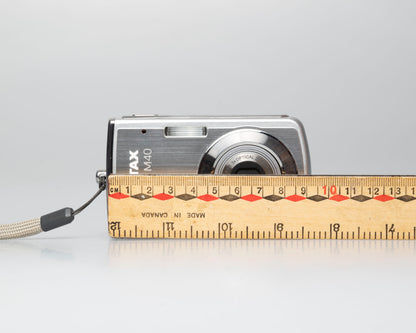 Pentax Optio M40 8 megapixel digicam w/ 8GB SD card + battery + charger (serial 9303499)